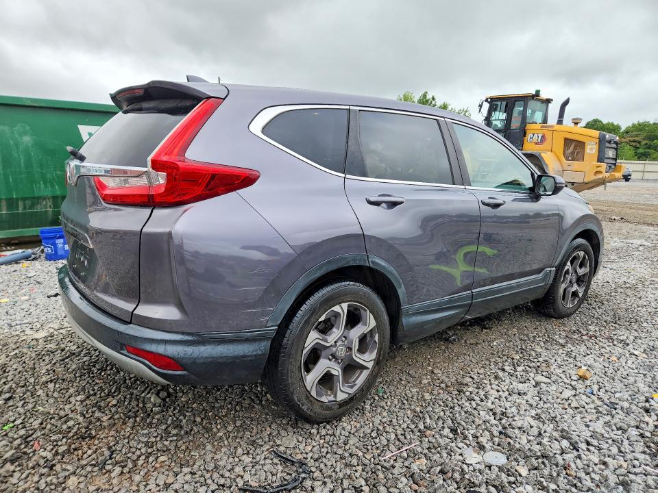 Photo 3 from auction – 2018 HONDA CR-V with VIN 7FARW1H59JE021349