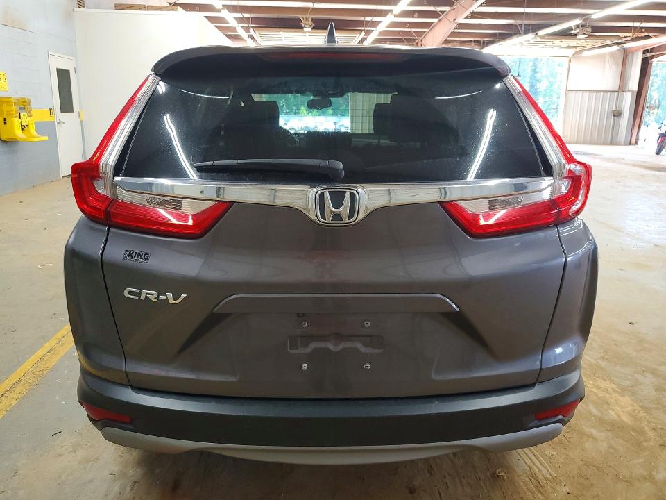 Photo 6 from auction – 2018 HONDA CR-V with VIN 7FARW1H84JE034133