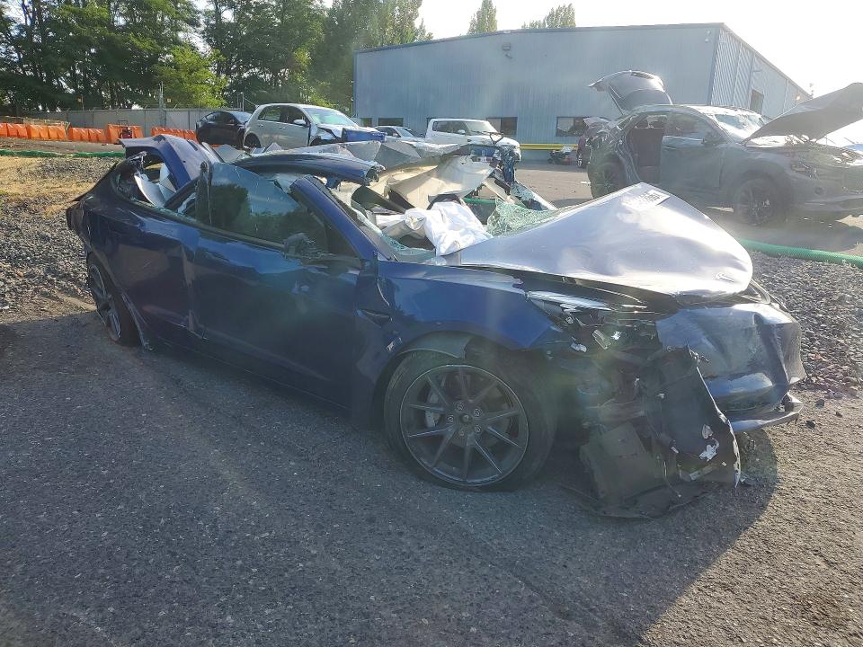 Photo 4 from auction – 2021 TESLA MODEL 3 with VIN 5YJ3E1EB5MF948044