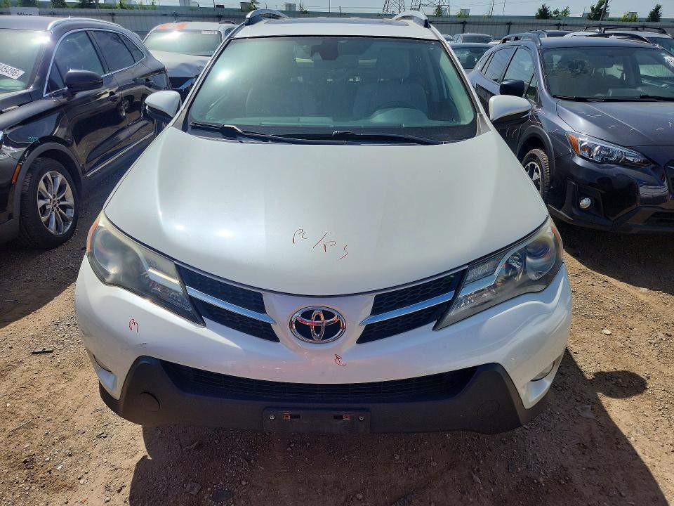 Photo 5 from auction – 2014 TOYOTA RAV4 with VIN 2T3DFREV8EW169646