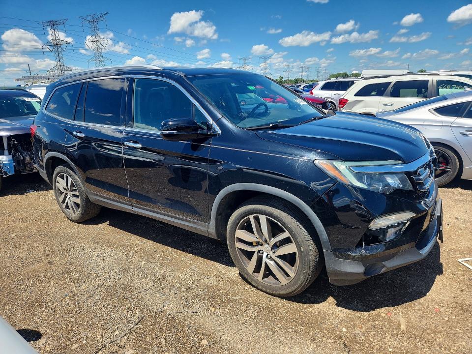 Photo 4 from auction – 2017 HONDA PILOT with VIN 5FNYF6H02HB097062
