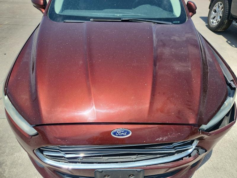 Photo 11 from auction – 2015 FORD FUSION with VIN 3FA6P0H92FR224328