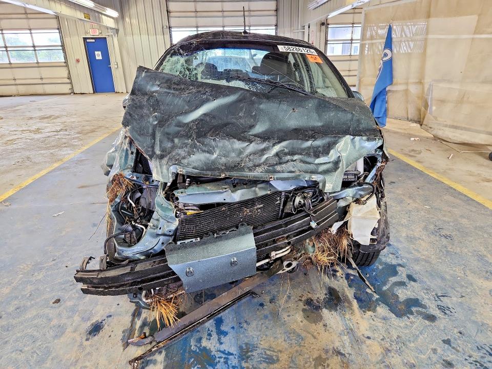 Photo 5 from auction – 2011 CHEVROLET AVEO with VIN KL1TD5DE0BB134865
