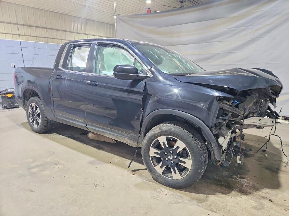 Photo 4 from auction – 2020 HONDA RIDGELINE with VIN 5FPYK3F59LB024800