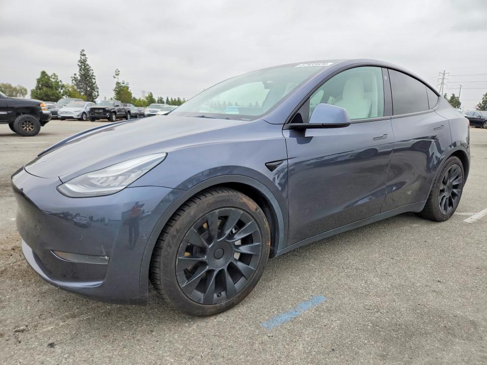 TESLA MODEL Y 2021 with VIN 5YJYGDEE6MF102436 - Photo from auction