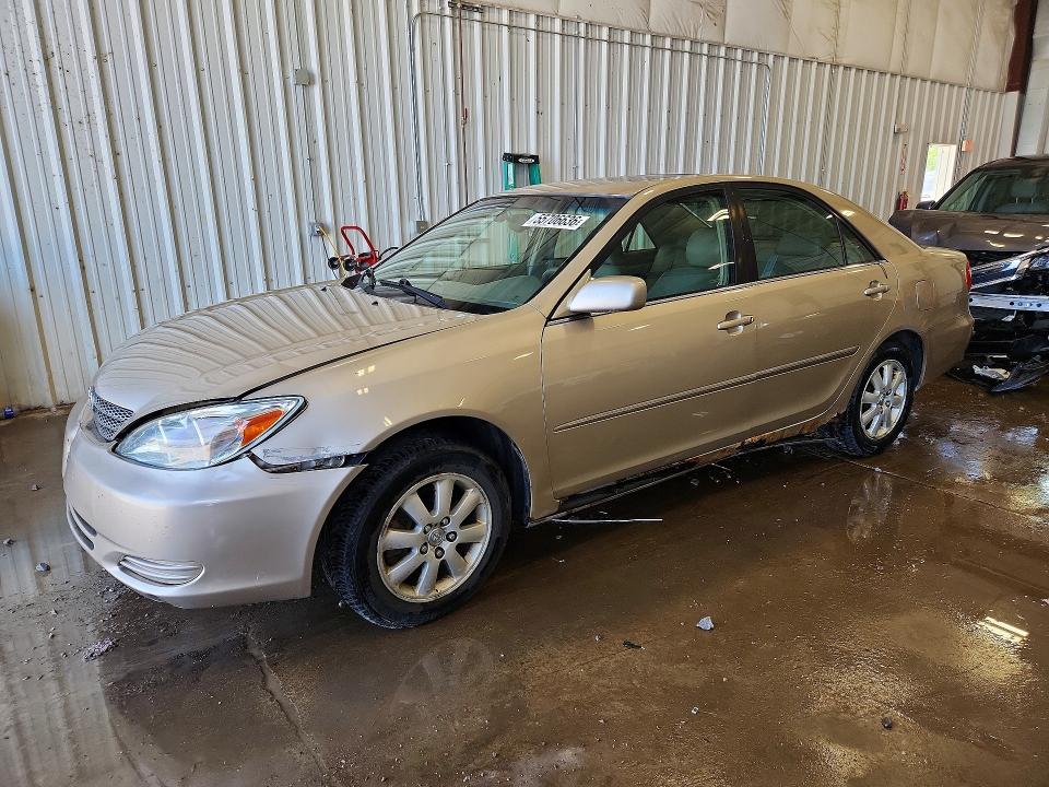 TOYOTA CAMRY 2002 with VIN JTDBF30KX20002853 - Photo from auction