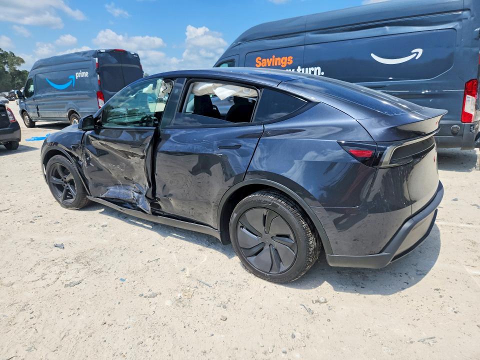 Photo 2 from auction – 2026 TESLA MODEL Y with VIN 7SAYGDED7TA620268