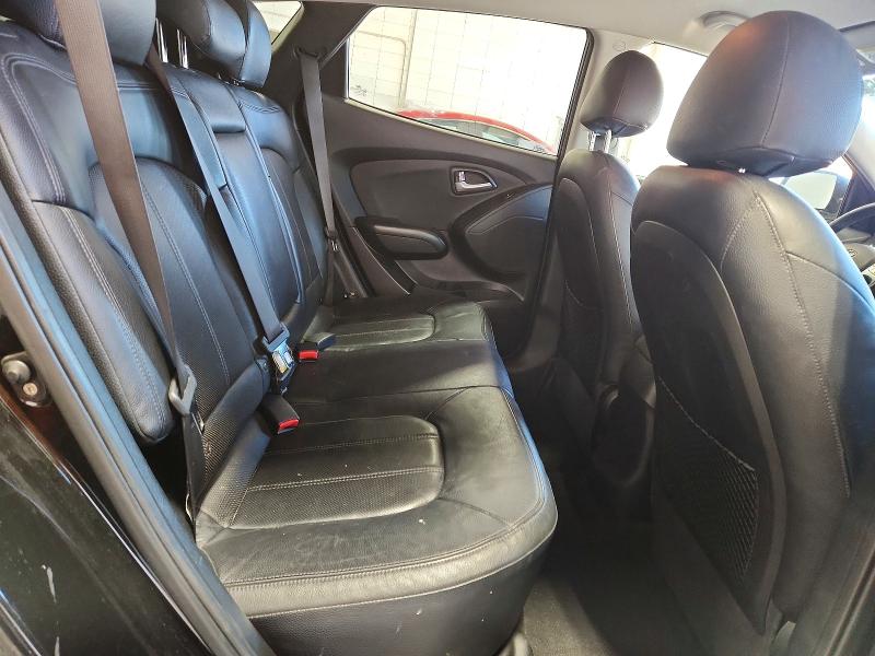 Photo 11 from auction – 2011 HYUNDAI TUCSON with VIN KM8JUCAC9BU310738