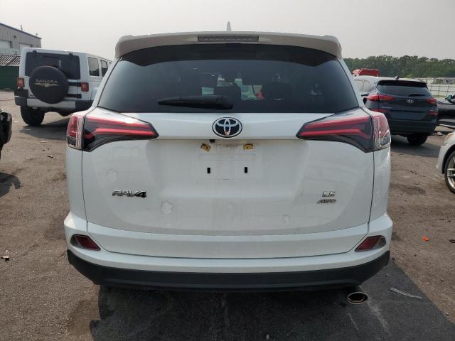 Photo 6 from auction – 2018 TOYOTA RAV4 LE with VIN JTMBFREV2JJ182344