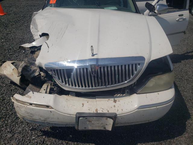 Photo 11 from auction – 2004 LINCOLN TOWN CAR E with VIN 1LNHM81W14Y660690