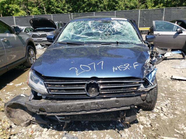 Photo 5 from auction – 2017 VOLKSWAGEN JETTA S with VIN 3VW2B7AJ1HM202077