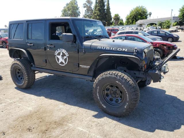 Foto 4 de la subasta – 2011 JEEP WRANGLER U con VIN 1J4BA6H13BL637093