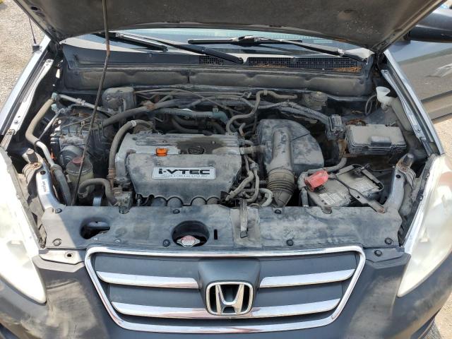 Photo 12 from auction – 2005 HONDA CR-V LX with VIN JHLRD78535C809683