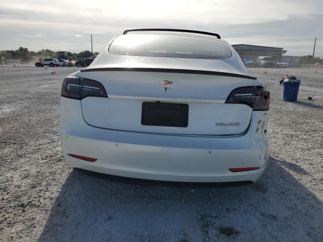 Photo 6 from auction – 2021 TESLA MODEL 3 with VIN 5YJ3E1EC6MF862721
