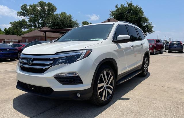 Photo 2 from auction – 2018 HONDA PILOT TOUR with VIN 5FNYF6H92JB000754
