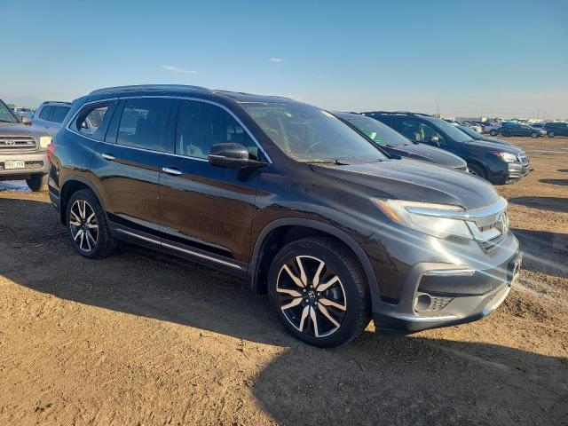Photo 4 from auction – 2019 HONDA PILOT ELIT with VIN 5FNYF6H06KB065450