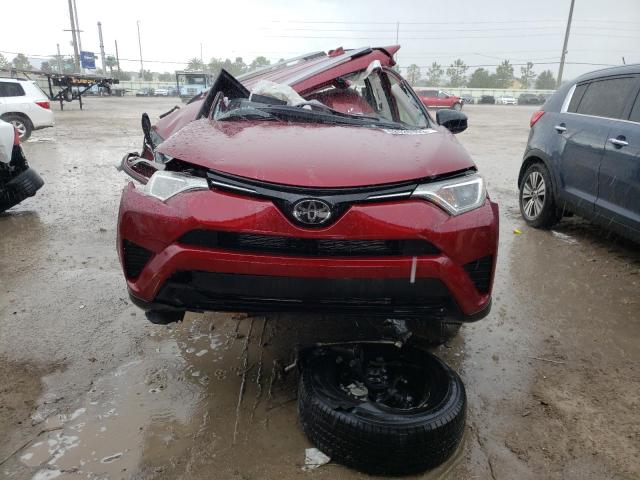 Photo 5 from auction – 2018 TOYOTA RAV4 LE with VIN JTMZFREV2JD119676