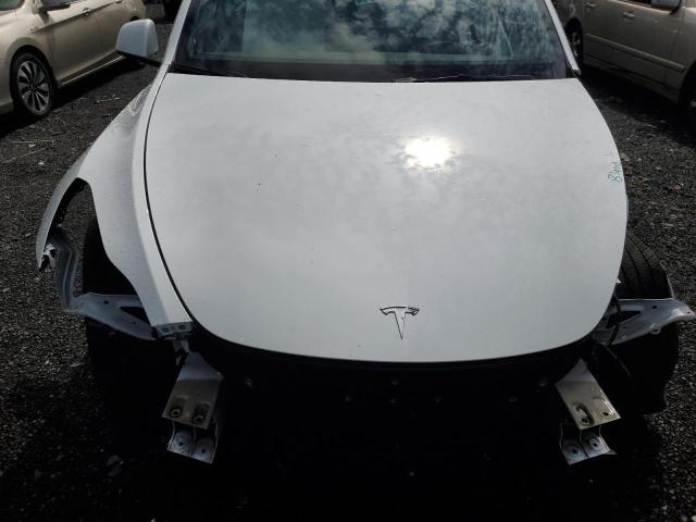 Photo 11 from auction – 2022 TESLA MODEL Y with VIN 7SAYGDEE3NF318362