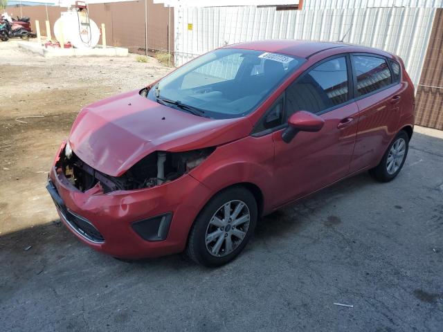 FORD FIESTA SE 2011 with VIN 3FADP4EJ7BM142941 - Photo from auction
