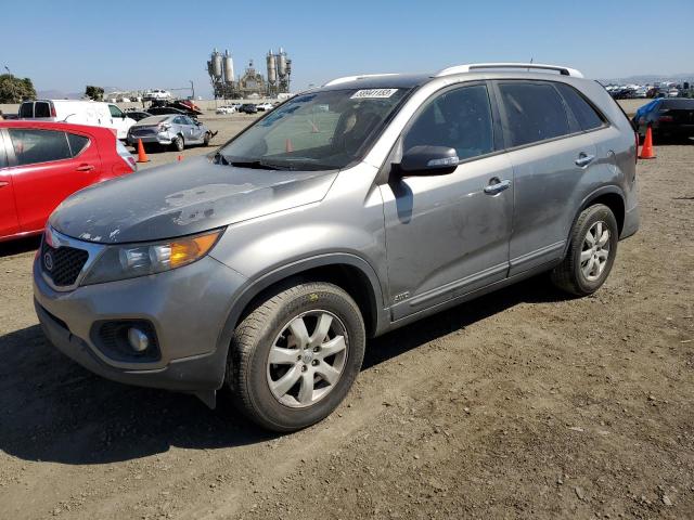 KIA SORENTO LX 2013 with VIN 5XYKTDA60DG385599 - Photo from auction