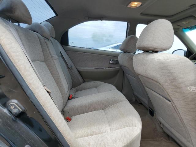 Photo 10 from auction – 2005 KIA OPTIMA LX with VIN KNAGD128155403424