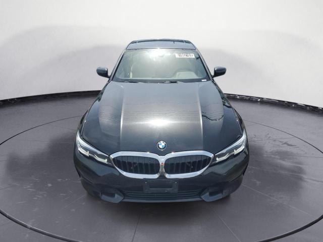 Photo 5 from auction – 2021 BMW 330I with VIN 3MW5R1J03M8C07958