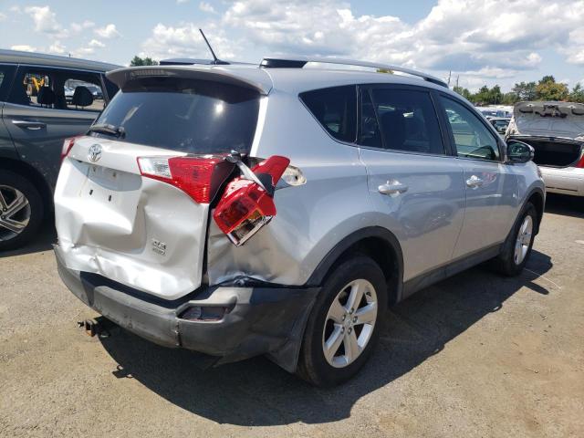 Photo 3 from auction – 2014 TOYOTA RAV4 XLE with VIN JTMRFREV7ED068729