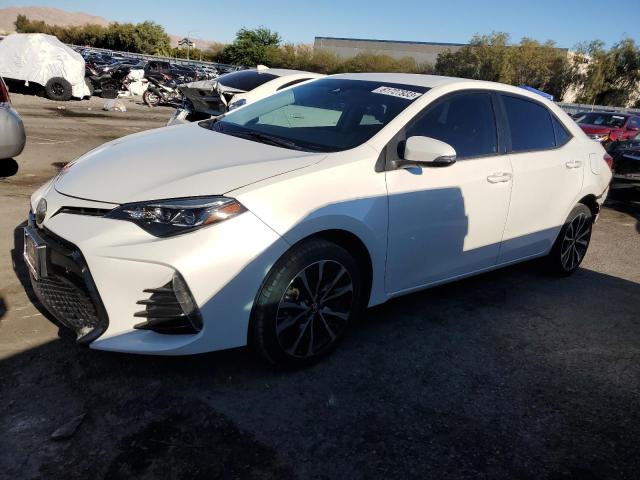TOYOTA COROLLA L 2017 with VIN 5YFBURHEXHP714804 - Photo from auction