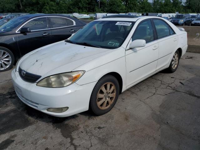 TOYOTA CAMRY LE 2003 with VIN 4T1BE30K73U203859 - Photo from auction