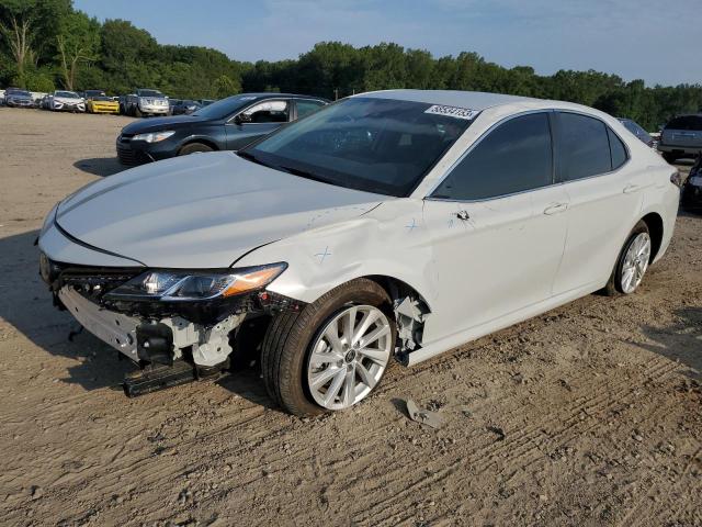 TOYOTA CAMRY LE 2023 with VIN 4T1C11AK2PU117111 - Photo from auction