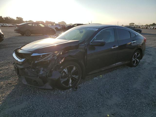 HONDA CIVIC TOUR 2016 with VIN 19XFC1F92GE213482 - Photo from auction