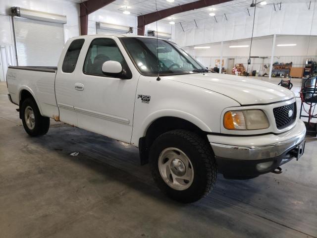 Photo 4 from auction – 2000 FORD F-150 with VIN 1FTRX18W4YNA80791