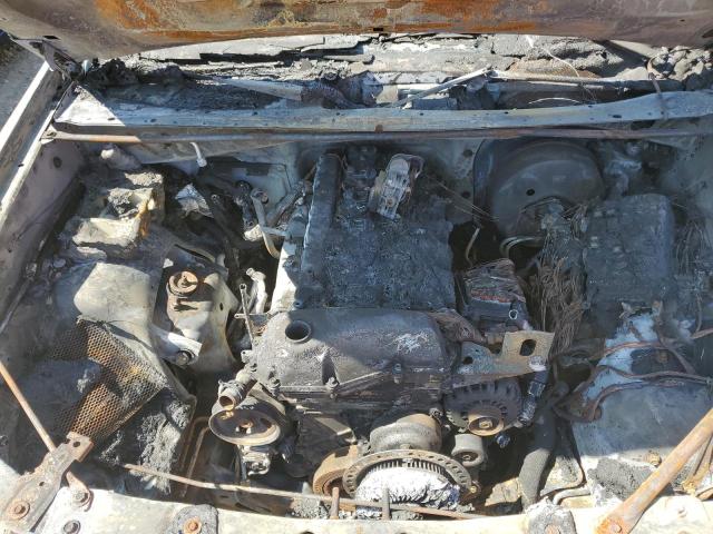 Photo 12 from auction – 2004 CHEVROLET TRAILBLAZE with VIN 1GNET16S146100338