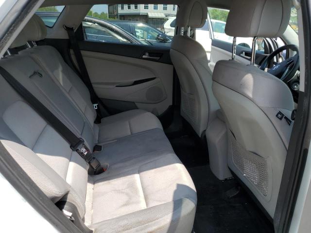 Photo 11 from auction – 2018 HYUNDAI TUCSON SE with VIN KM8J2CA44JU674014
