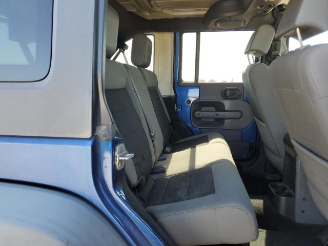 Photo 10 from auction – 2010 JEEP WRANGLER U with VIN 1J4BA3H12AL158645