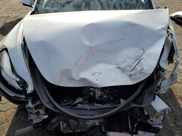 Photo 11 from auction – 2022 TESLA MODEL 3 with VIN 5YJ3E1EA2NF144793