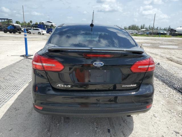 Photo 6 from auction – 2017 FORD FOCUS TITA with VIN 1FADP3J23HL228069
