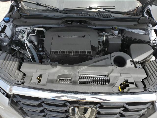 Photo 12 from auction – 2023 HONDA PILOT ELIT with VIN 5FNYG1H81PB006237