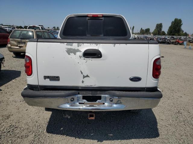 Photo 6 from auction – 2003 FORD F150 SUPER with VIN 1FTRW08L13KB72664