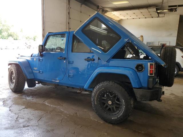 Photo 2 from auction – 2011 JEEP WRANGLER U with VIN 1J4BA5H16BL636465