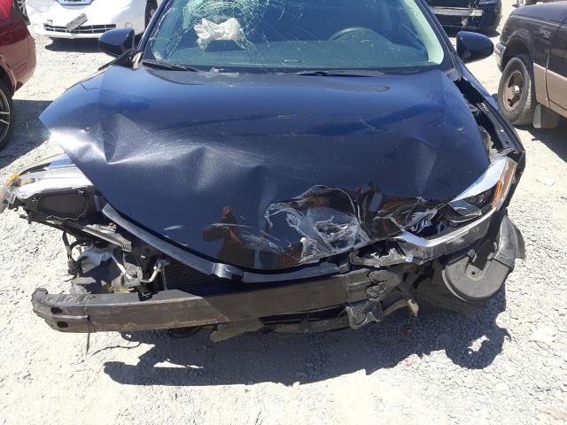 Photo 11 from auction – 2014 TOYOTA COROLLA L with VIN 5YFBURHE0EP071679
