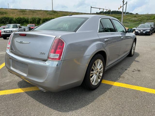 Photo 4 from auction – 2013 CHRYSLER 300 with VIN 2C3CCARG7DH685582