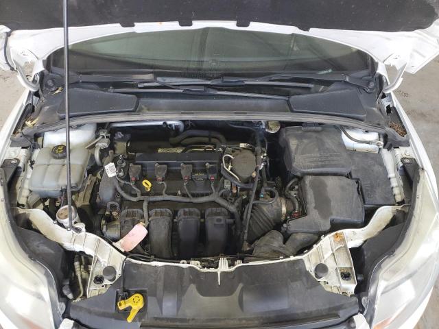 Photo 11 from auction – 2014 FORD FOCUS S with VIN 1FADP3E21EL178519