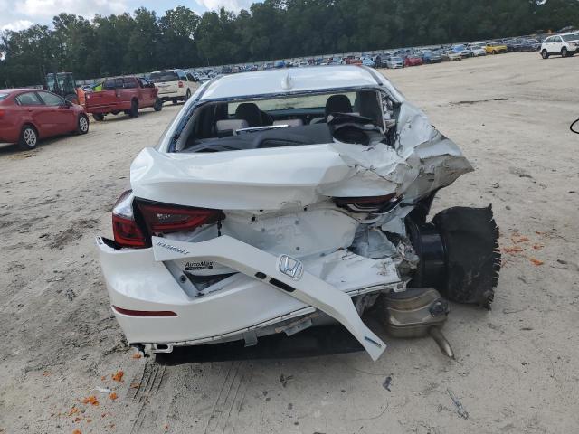 Photo 6 from auction – 2022 HONDA INSIGHT EX with VIN 19XZE4F58NE001561