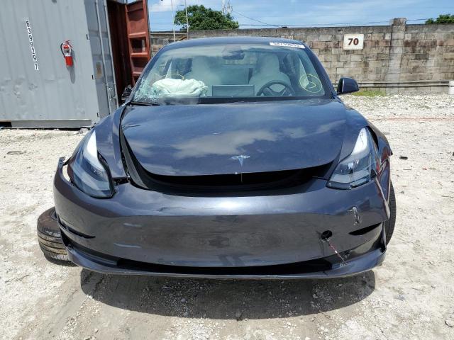 Photo 5 from auction – 2021 TESLA MODEL 3 with VIN 5YJ3E1EA6MF025840