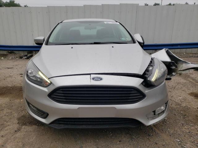 Снимка 5 от търг – 2017 FORD FOCUS с VIN 1FADP3FE8HL323925