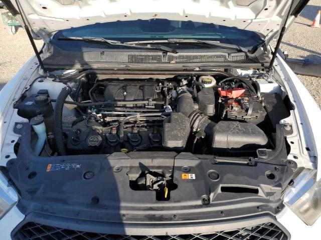 Photo 11 from auction – 2014 FORD TAURUS POL with VIN 1FAHP2MK5EG185477