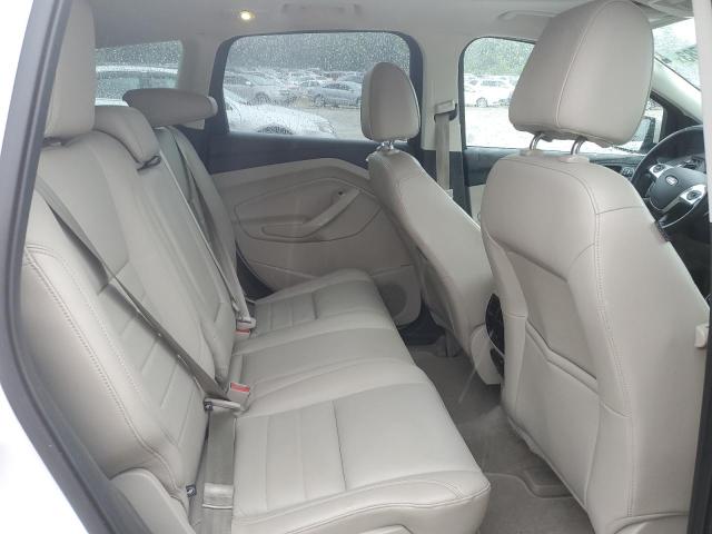 Photo 11 from auction – 2016 FORD ESCAPE TIT with VIN 1FMCU9J95GUB29174