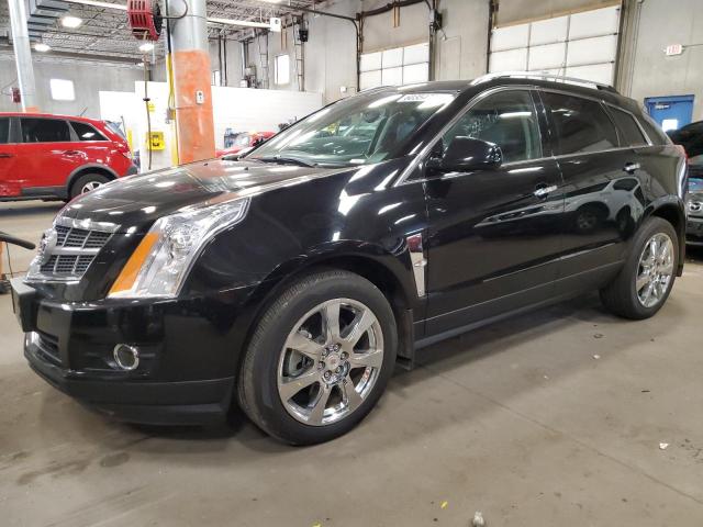 CADILLAC SRX PERFOR 2010 with VIN 3GYFNEEY8AS628593 - Photo from auction