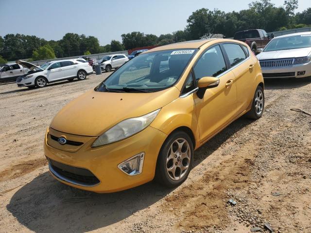 FORD FIESTA SES 2011 with VIN 3FADP4FJ7BM113857 - Photo from auction